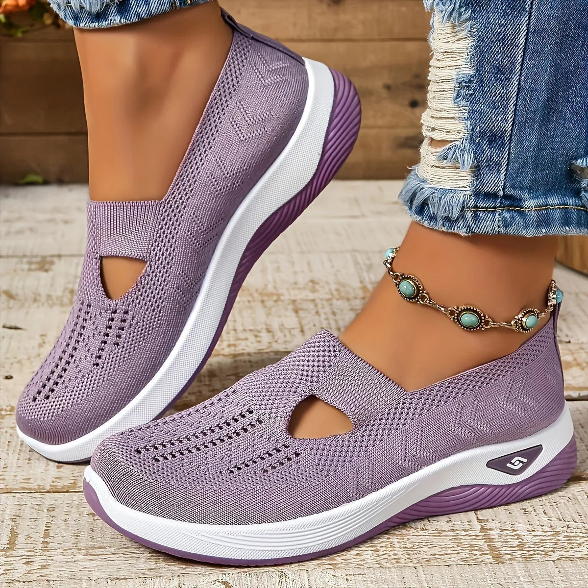 Lilac woven trainers with cut-out upper and two-tone white and purple sole, side angle showing textured knit pattern