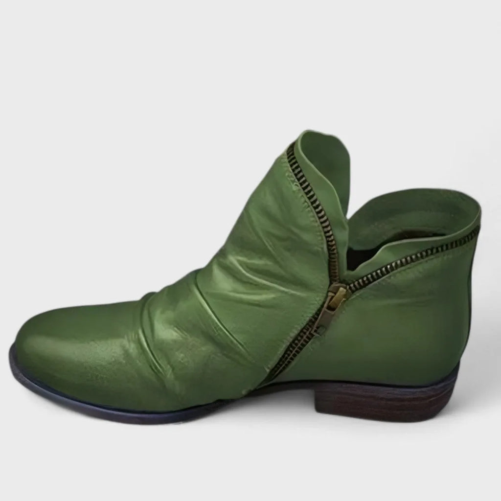 Olive green leather ankle boot with folded collar, brass zip and short stacked heel