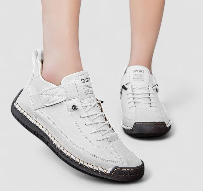 Pair of comfort trainers shown together highlighting the elastic strap, lace-up front and cushioned sole
