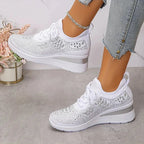Bright fuchsia pink knit trainers with pastel rhinestone pattern and matching pink wedge sole