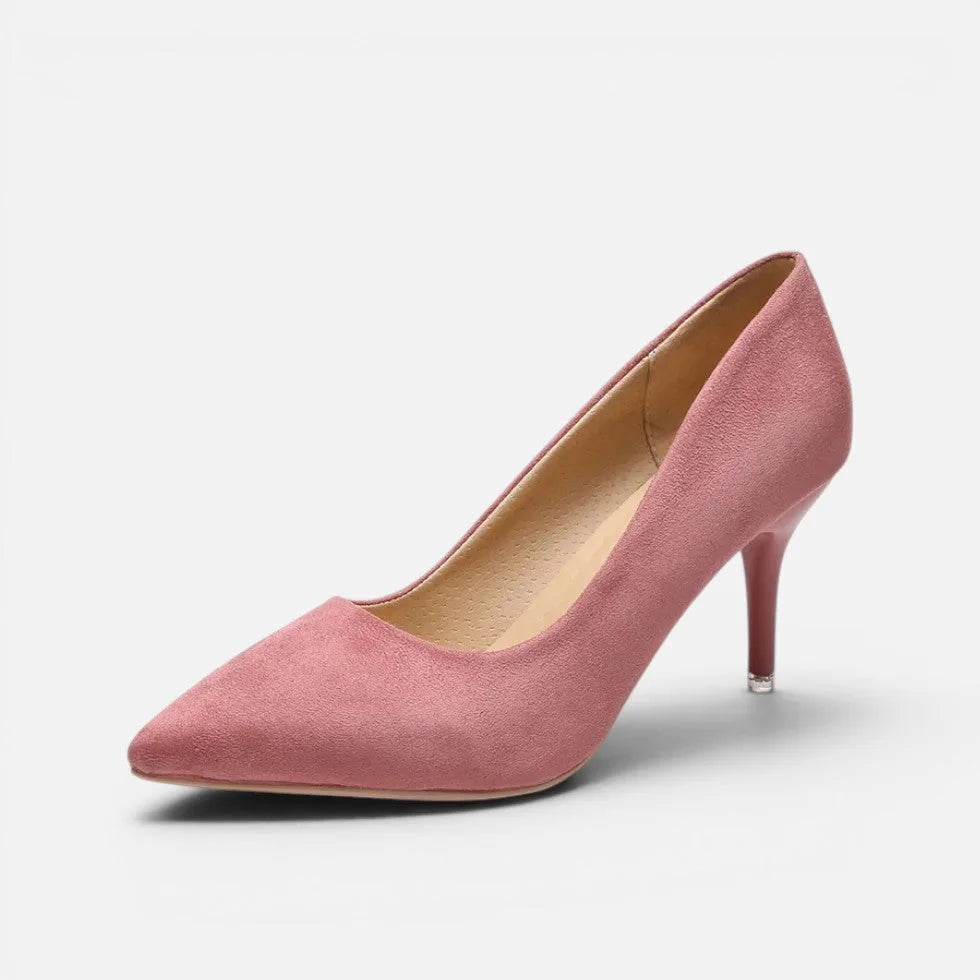 Side view of dusky pink suede pointed toe kitten heel pump with slender heel and soft texture