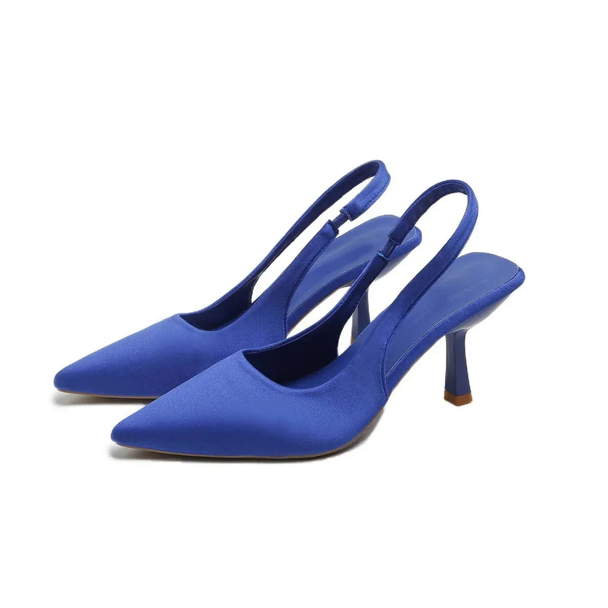 Pair of cobalt blue satin pointed-toe slingback pumps shown at a three-quarter angle