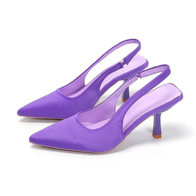 Purple satin slingback pumps with lilac insole, shown in a matching pair on a plain background