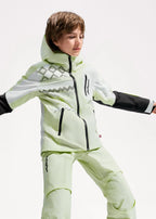 Side view of boy in pale green ski jacket leaning forward on a snowboard, showing the contrast sleeve panelling