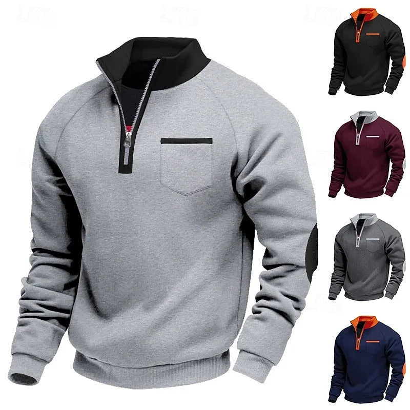 Light grey quarter-zip pullover with black funnel collar, chest pocket and elbow patches, front view