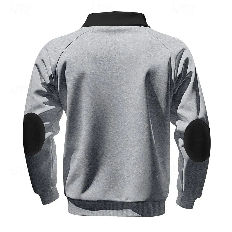 Navy blue quarter-zip pullover folded flat showing overall silhouette and colour block design