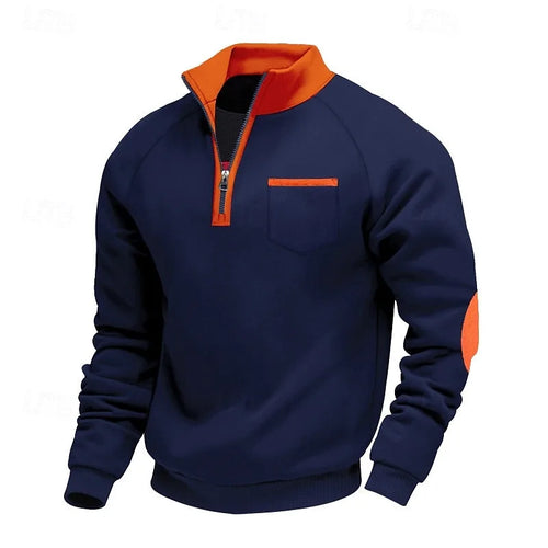 Navy blue quarter-zip pullover with orange collar and elbow patches, front three-quarter view