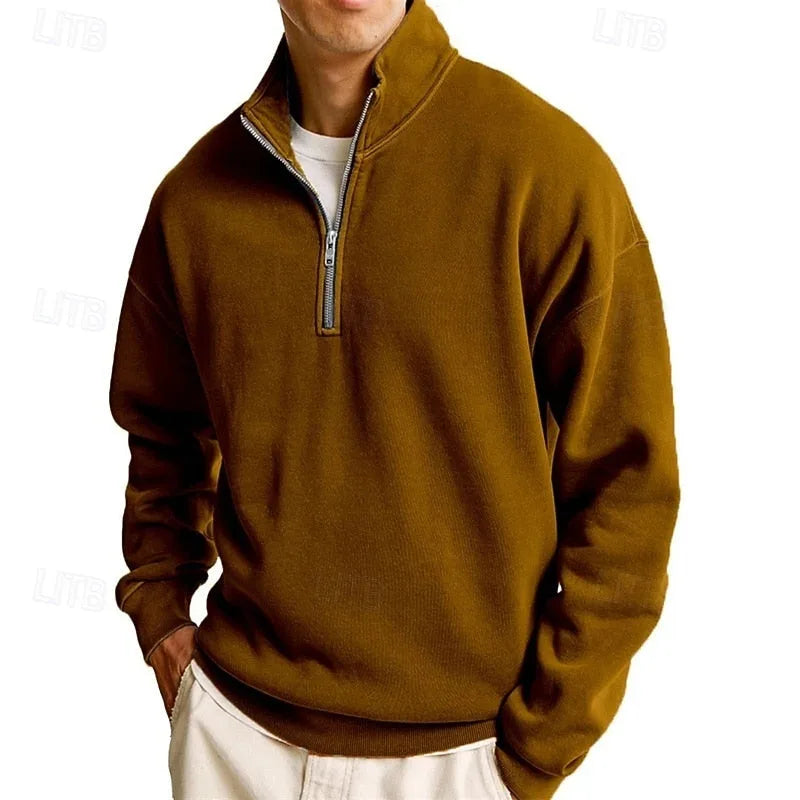 Front view of a brown quarter-zip sweatshirt showing raised stitch seams on the shoulder and sleeve