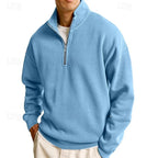 Side angle of a sky blue quarter-zip sweatshirt showing the brushed fleece texture and zip pull