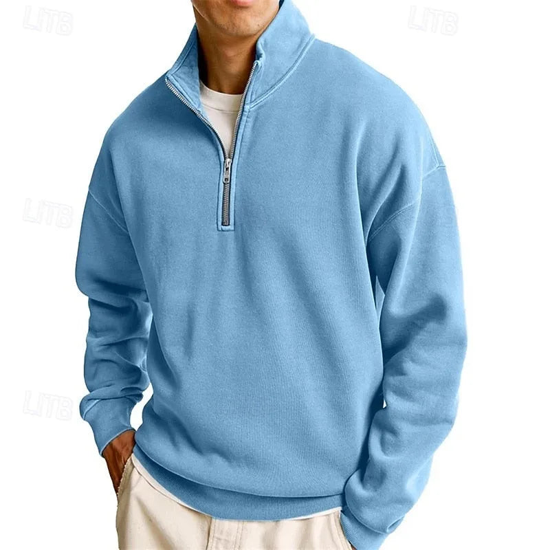 Side angle of a sky blue quarter-zip sweatshirt showing the brushed fleece texture and zip pull