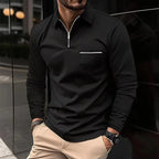Black long-sleeve quarter-zip polo shirt with chest pocket, silver zipper and pointed collar