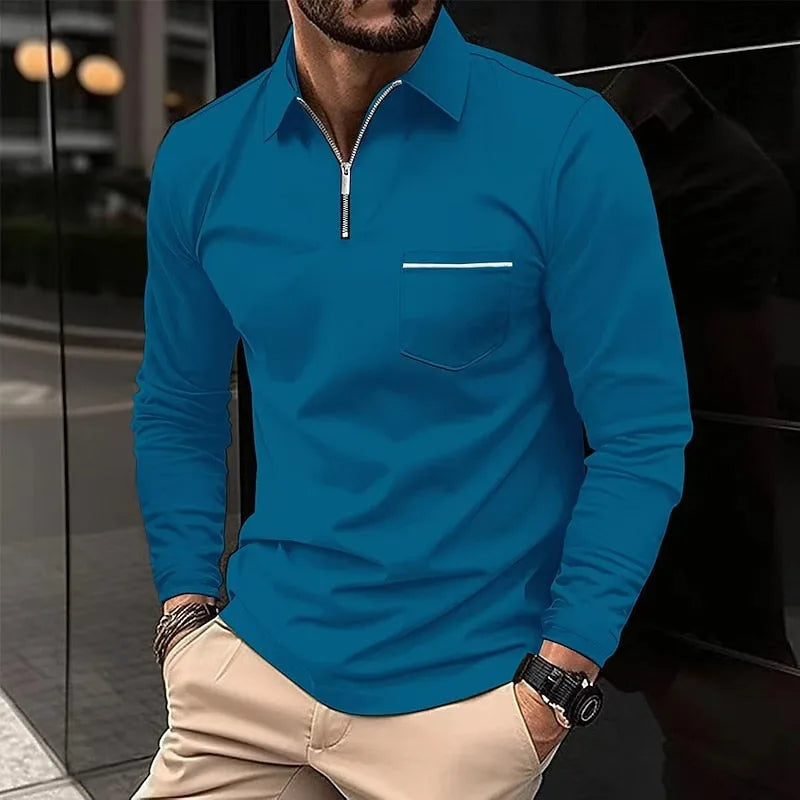 Teal blue quarter-zip polo shirt with ribbed cuffs and contrast striped pocket trim, worn untucked