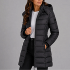 Black quilted puffer coat with detachable hood and ribbed cuffs, styled with jeans and a white t-shirt