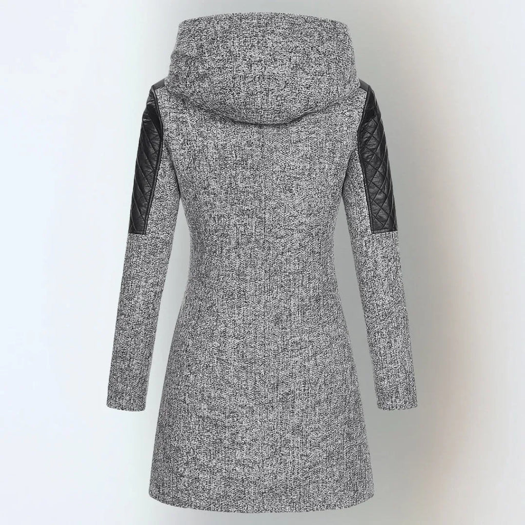 Back view of a light grey marl coat showing the hood and quilted leather panels on the sleeves
