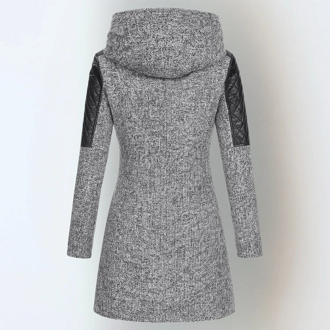 Back view of a light grey marl coat showing the hood and quilted leather panels on the sleeves