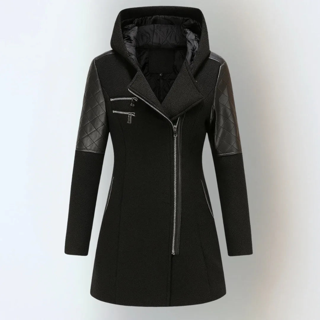 Front view of a black hooded coat with quilted leather shoulder panels and diagonal front zip