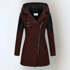Front view of a burgundy red hooded coat with black quilted leather sleeves and side zip pockets