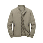 Khaki jacket shown fully open, revealing diamond-quilted lining and front zip against a plain background