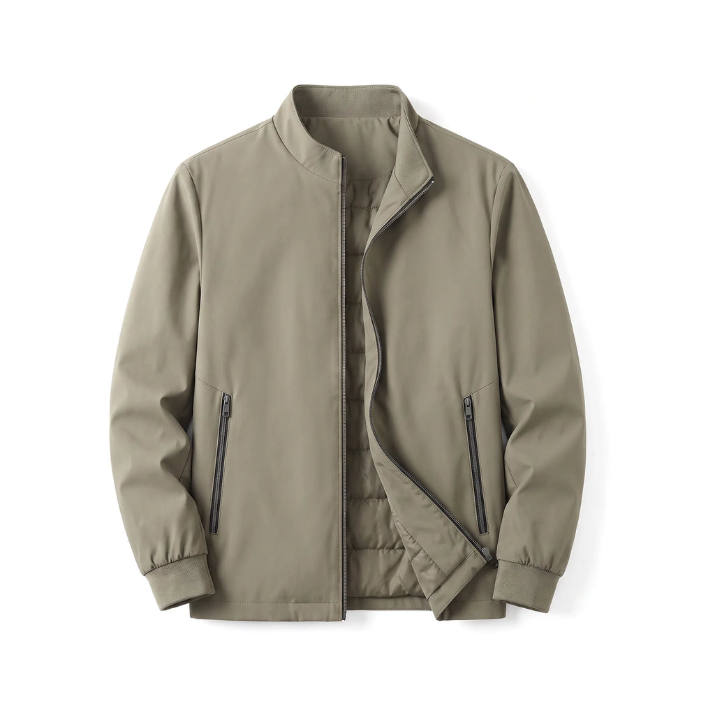 Front view of the khaki jacket half open, showing the zipped side pockets and ribbed cuffs