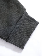 Side angle view highlighting the drop shoulder raglan sleeve construction