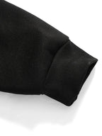 Front three-quarter view showing the fit through the chest and shoulders