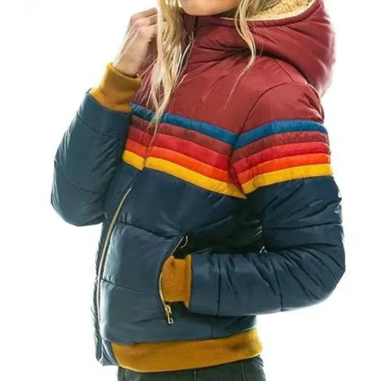 Side profile of navy puffer jacket with fleece-lined hood, burgundy panel and rainbow stripe detail across the chest