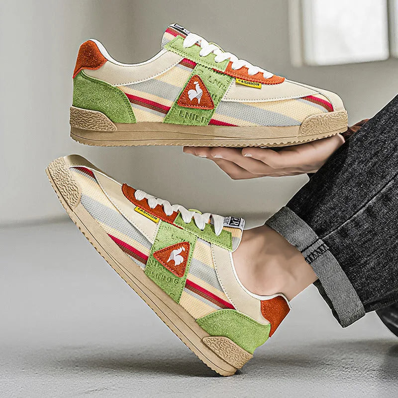 Front view of laced-up trainer showing rooster logo patch and yellow fashion tab
