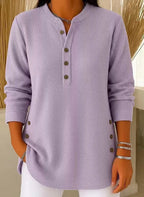 Lavender ribbed Henley tunic top with long sleeves, showing the soft knit texture and button placket