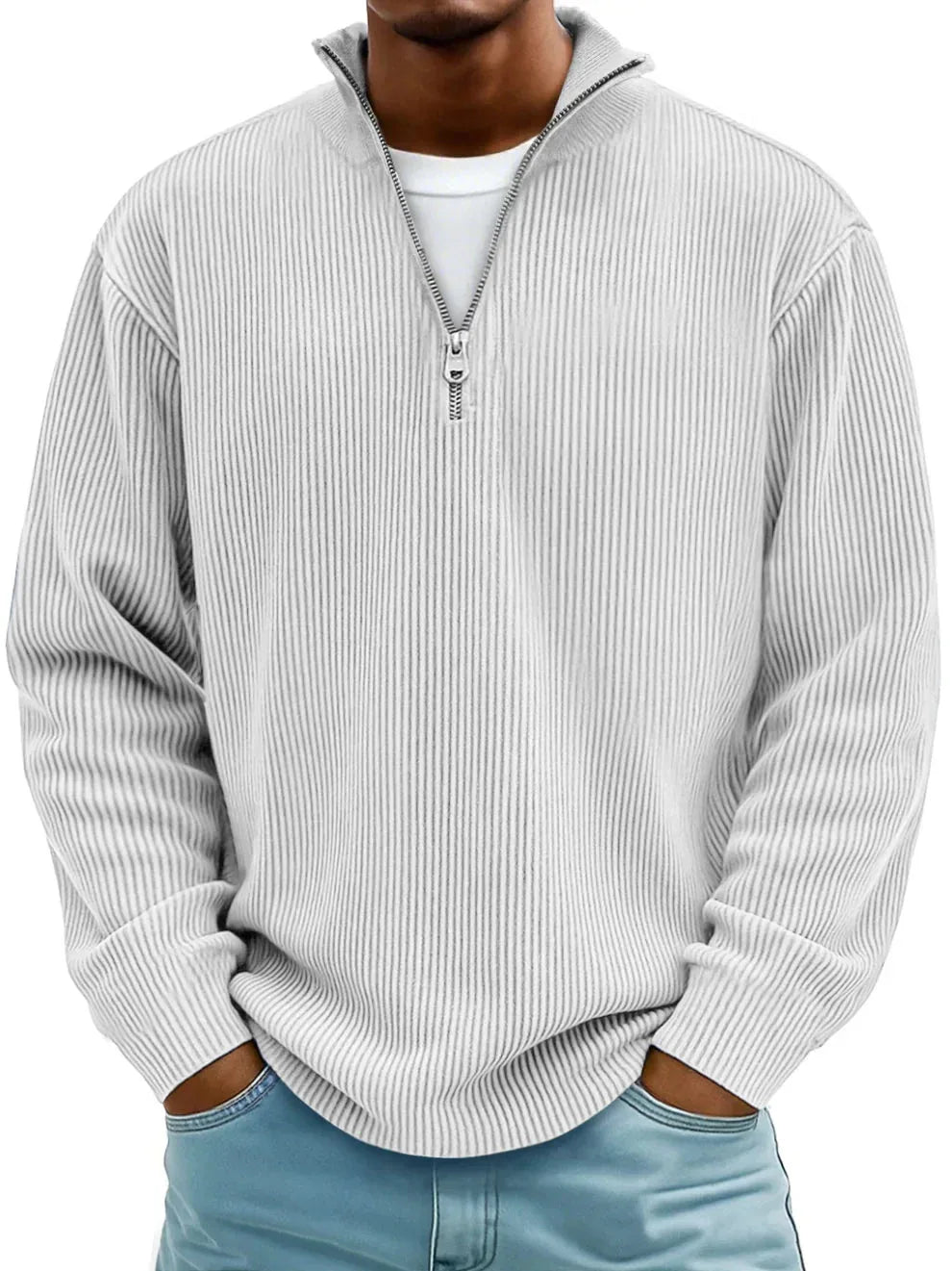 Light grey ribbed knit jumper with half-zip collar and dropped shoulder seams, styled with denim