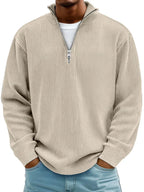 Beige ribbed quarter-zip knit jumper with silver zipper, shown from the chest up over a white t-shirt