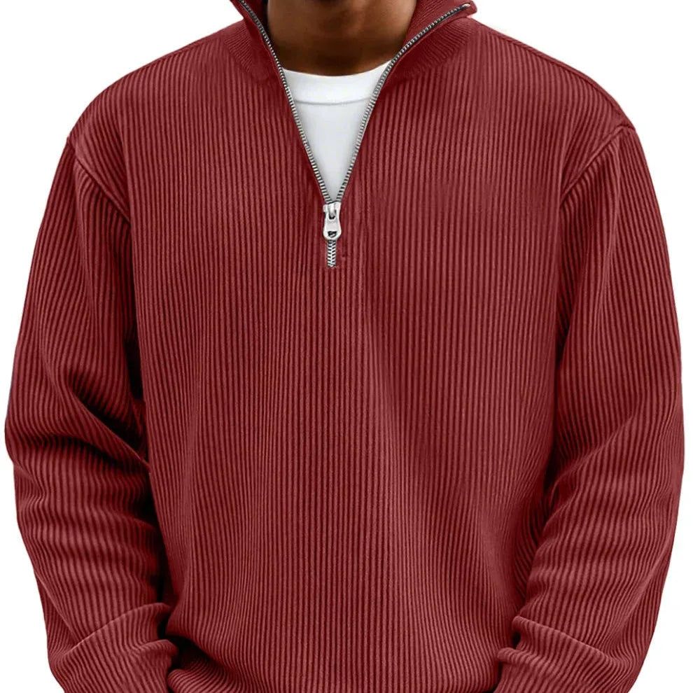 Light blue ribbed quarter-zip jumper paired with light denim, full front view with hands in pockets