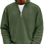 Charcoal grey ribbed quarter-zip jumper worn by model, front close-up showing relaxed fit