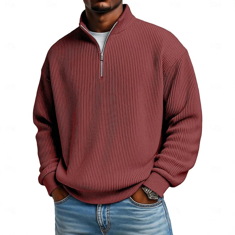 Close-up front view of the wine red ribbed quarter-zip jumper showing the ribbed knit texture