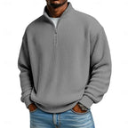 Colour lineup showing the pullover in sky blue, lilac, wine and sage green side by side