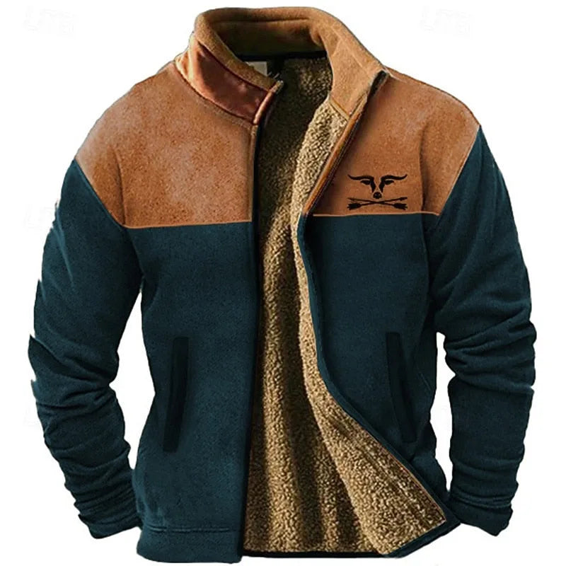 Dark blue and tan fleece jacket with contrast shoulder panel, zipped open to reveal the plush sherpa lining and embroidered logo.
