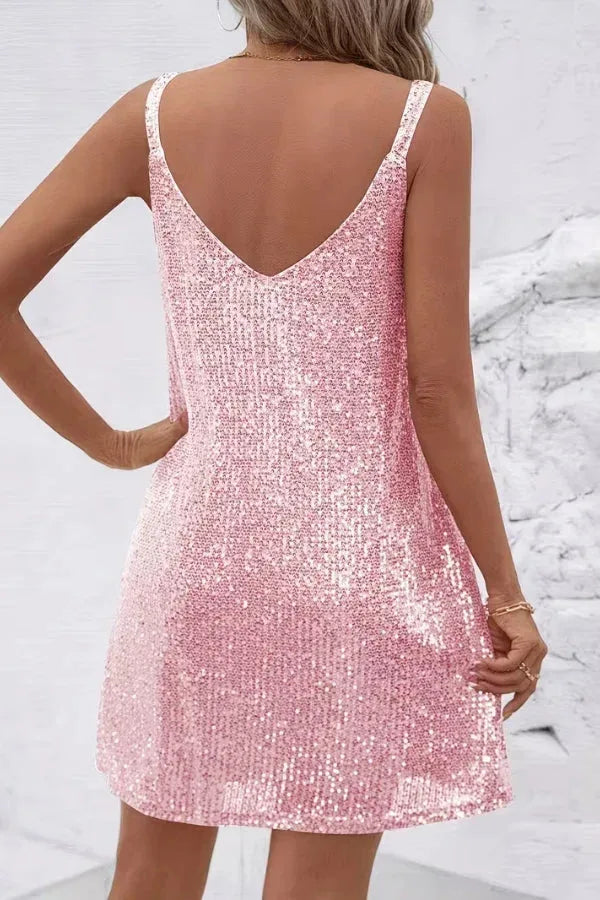 Back view of the pink sequin mini dress showing the V-shaped back and thin adjustable straps