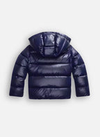 Back view of the navy blue glossy puffer jacket showing the hood, quilted panels and boxy silhouette