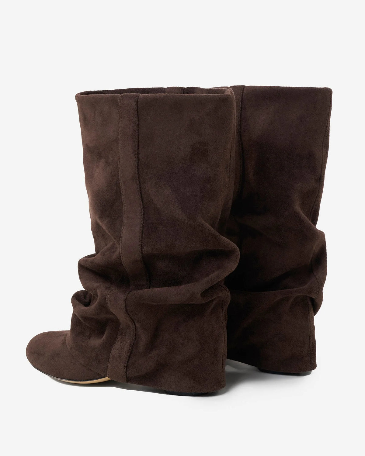 Back view of a pair of slouchy suede boots showing the ruched shaft and stacked hidden heel