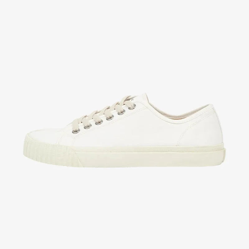Side profile of a single white canvas split-toe trainer showing the low-top silhouette and ribbed sole