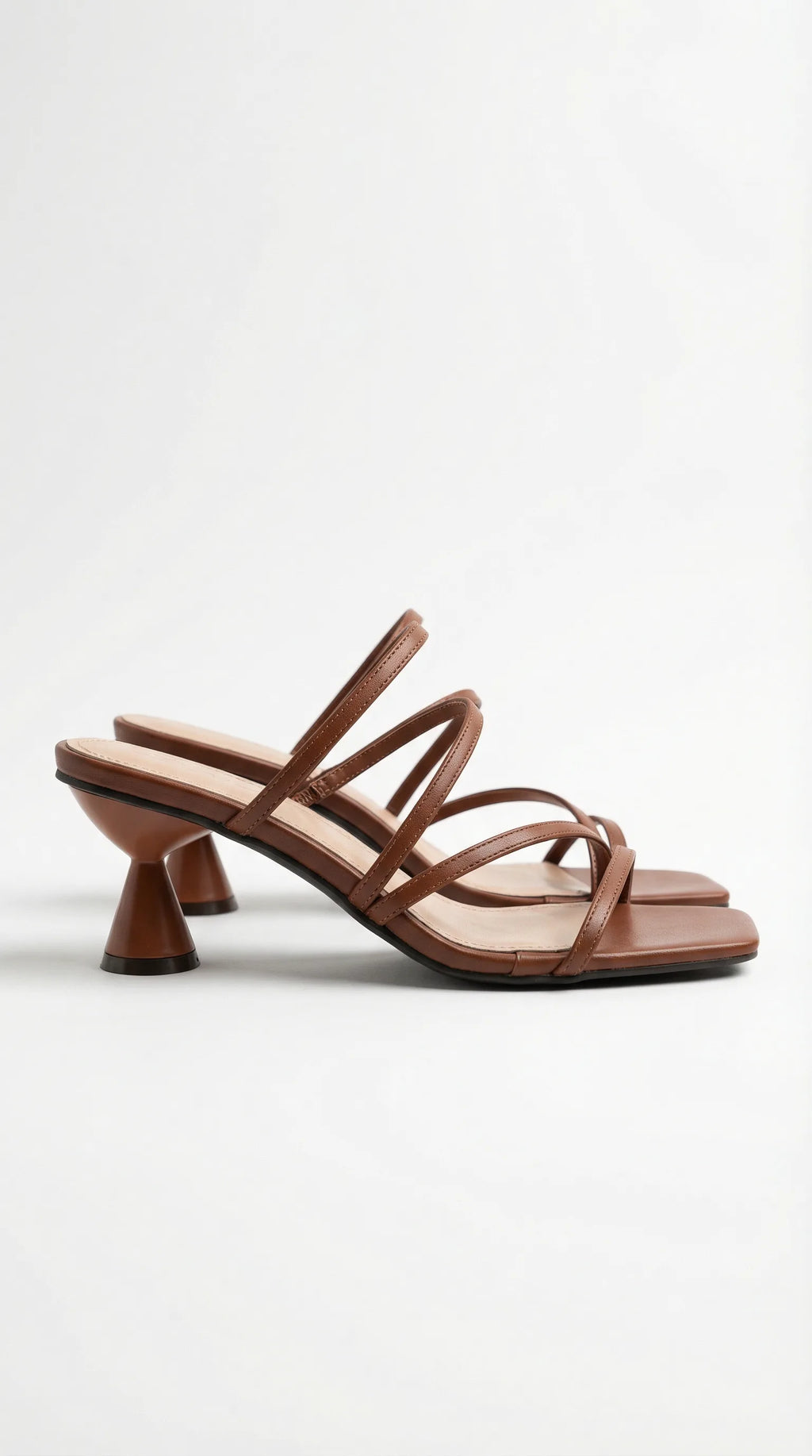 Side view of tan brown strappy sandal with square open toe and cone heel