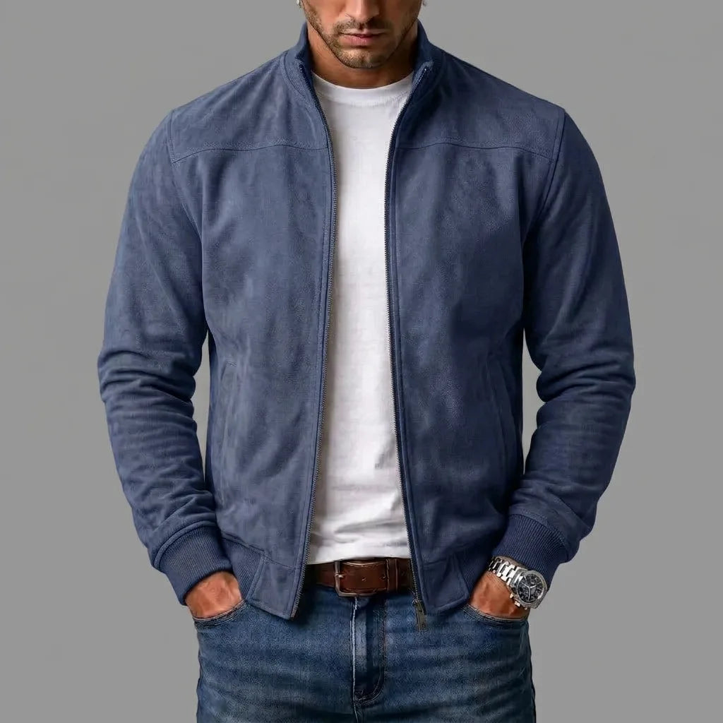Navy blue suede bomber jacket unzipped, close-up of ribbed cuffs and front pockets