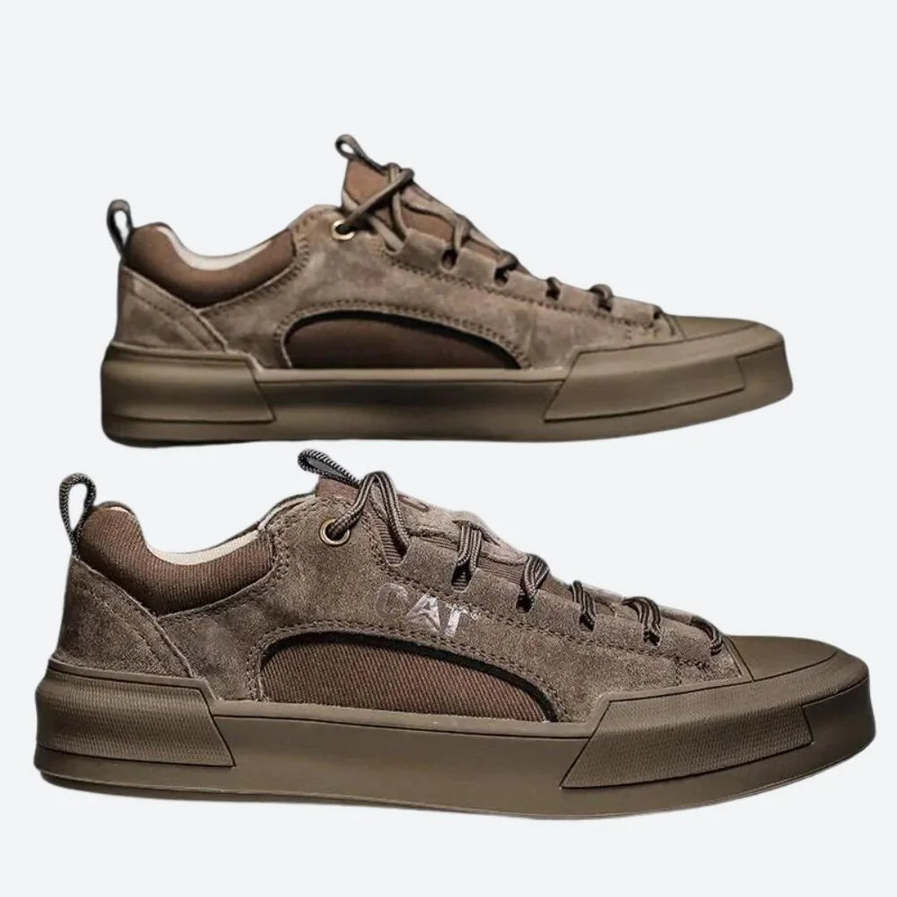 Side view pair of khaki suede low-top trainers with matching tonal rubber sole and laces