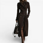 Dark brown suede trench coat worn open at the front, paired with over-the-knee leather boots