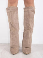 Side view of taupe beige suede fold-over boots with pointed toe and stacked block heel