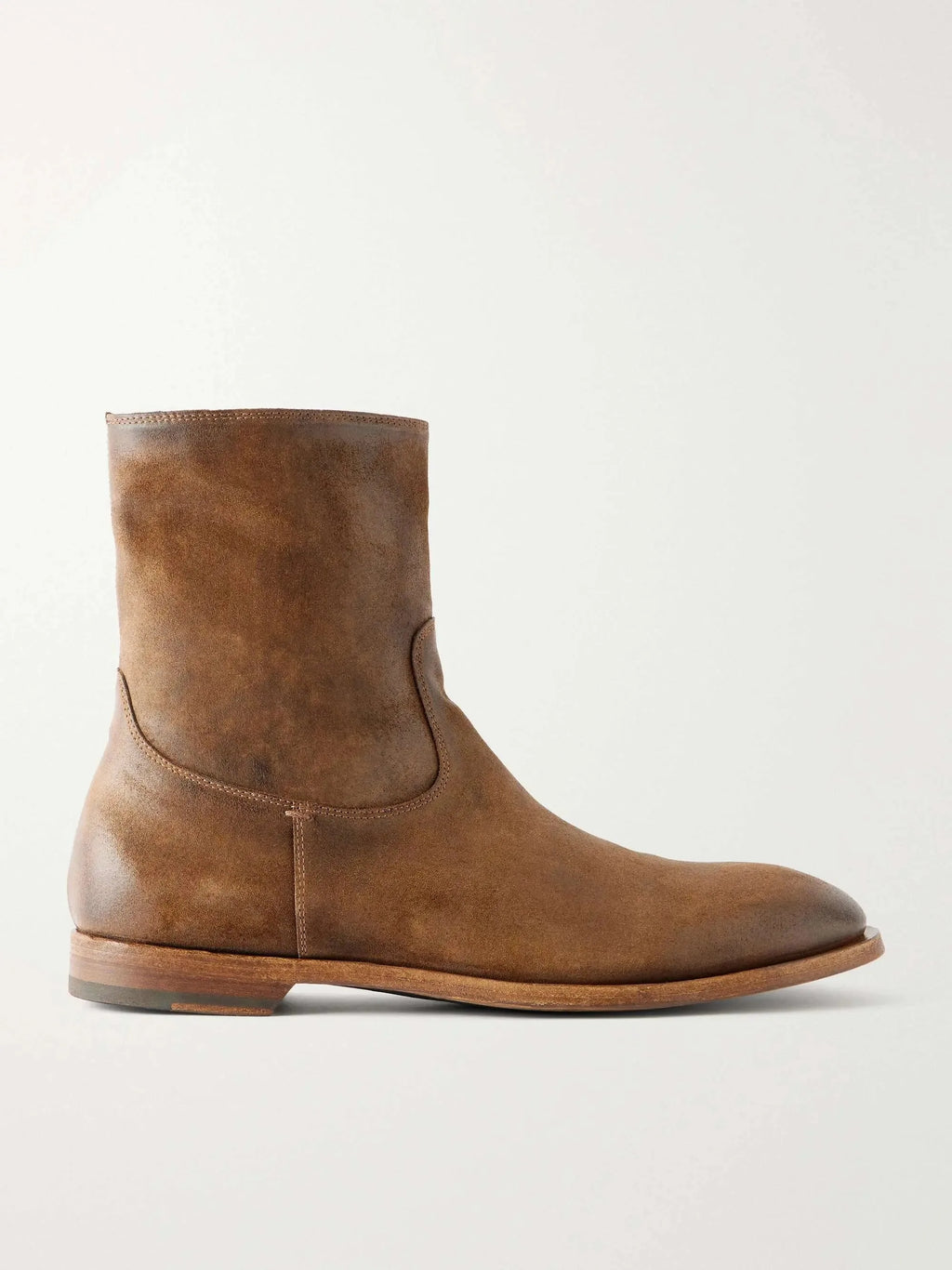 Side profile of a tan waxed-suede biker boot with rounded toe, stacked heel and subtle top-stitching detail