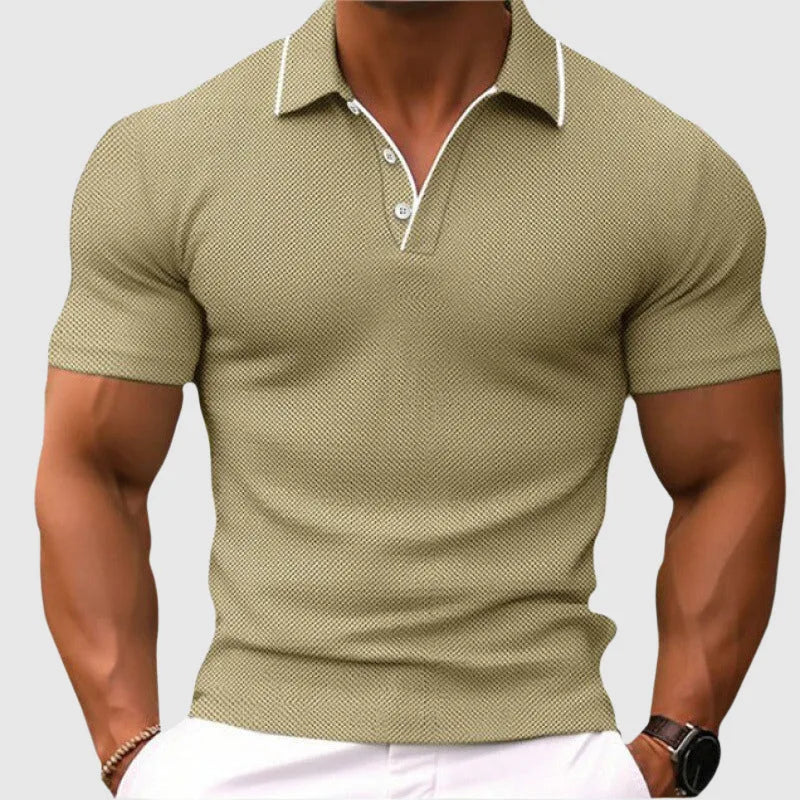Close-up of a khaki textured knit polo shirt showing the white trim detail along the collar edge