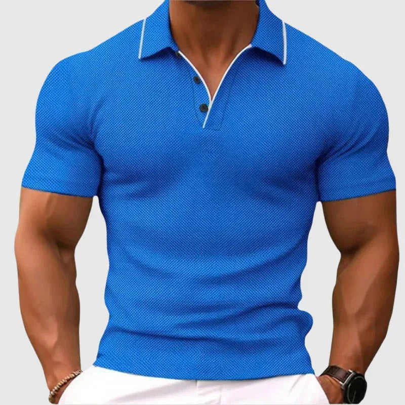 Side-angled view of the blue textured knit polo shirt highlighting the slim fit through the torso