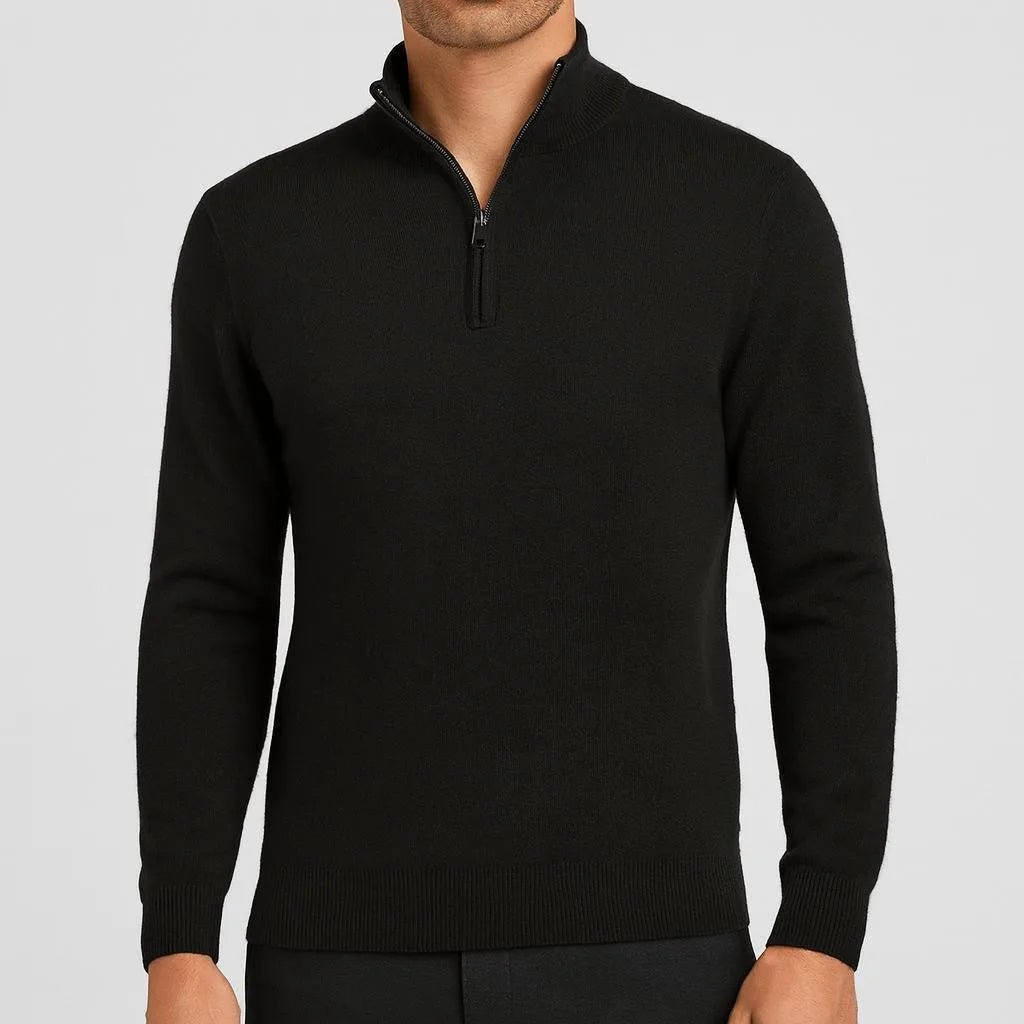 Black quarter-zip jumper with matching ribbed cuffs and hem, styled with dark trousers