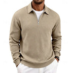 Front view of man wearing a khaki textured quarter-zip pullover with polo collar and half-zip fastening