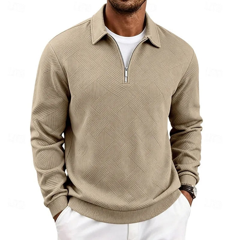 Front view of man wearing a khaki textured quarter-zip pullover with polo collar and half-zip fastening